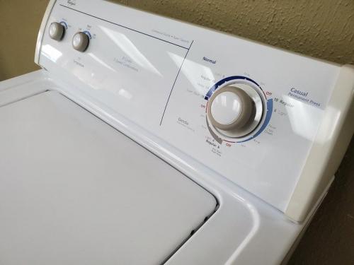 Top load washer mechanical controls